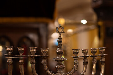 Elegant menorah shines in synagogue symbolizing Jewish heritage tradition spiritual celebration