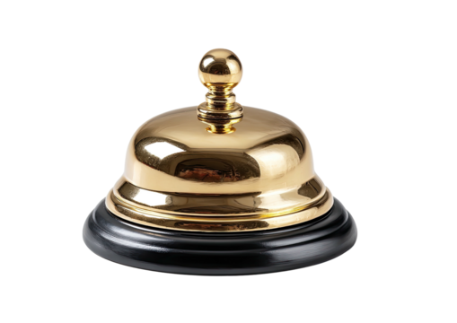 Polished brass service bell sits on a black base