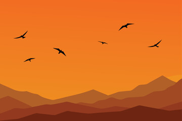 Silhouettes of birds flying over mountains at sunset Vector