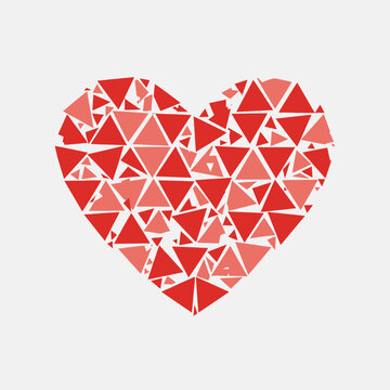 Abstract geometric heart shape composed of various red and pink triangles, symbolizing love and emotion on a clean white background.