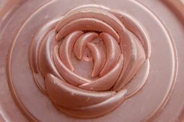 Close-up detail of a flower shaped ornament made of plastic