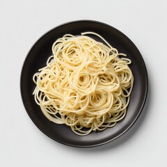 Uncooked spaghetti on a dark plate