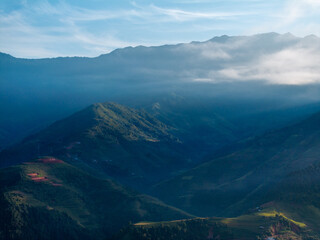 Aerial view of golden rice terraces in Kim Noi commune at Mu Cang Chai town near Sapa city, Vietnam. Beautiful terraced rice field in harvest season in Yen Bai province