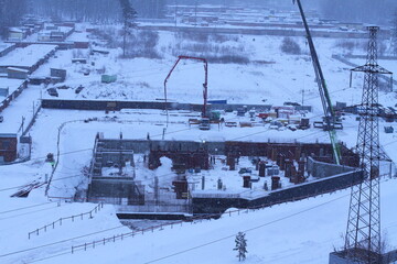 The first stage of building construction. Tying the reinforcement. Preparing for pouring concrete for the supports and walls. General view from above.	
