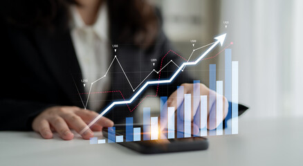 A business professional engages with financial data on a smartphone while analyzing a rising graph, symbolizing growth and strategic market insights in a modern office environment. Scalp