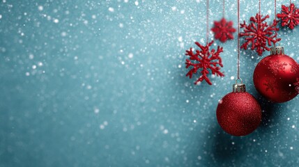 christmas background with red baubles and snowflakes on blue backdrop festive holiday decoration concept
