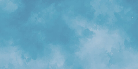 A clear blue sky with fluffy white clouds on a bright summer day