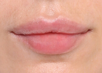 Fototapeta premium lips of a young girl woman, Caucasian