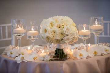 Elegant Wedding Table with White Rose Centerpiece and Floating C