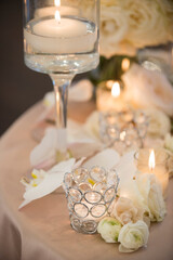 Floating Candle and Crystal Holder Surrounded by White Florals