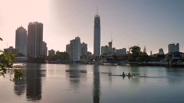 Wide shot of kayak on the Nerang River, viewed from Home of the Arts of Surfers Paradise, Queensland, Australia.