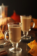 Glasses with warm pumpkin latte	