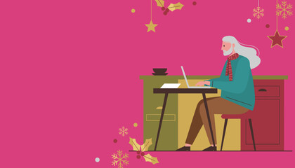 Senior man working on laptop at a festive desk with Christmas decorations on a magenta background