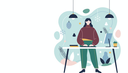 Woman working at a festive standing desk decorated with winter ornaments Holiday work and productivity