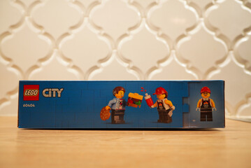 Naklejka premium Lego City 60404 Burger Truck Box Set on a Wooden Surface