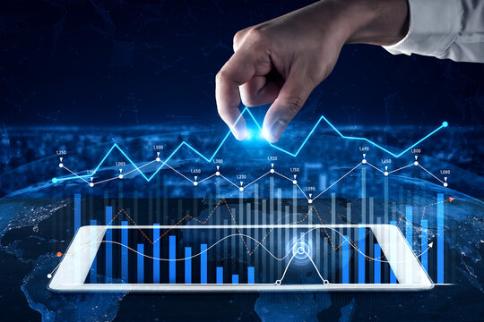 A hand interacts with a digital tablet displaying a global financial graph, showcasing market trends and data visualization for effective business analysis. Scalp
