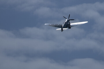 Spitfire plane in flight on sunny day. High quality photo