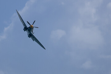 Spitfire plane in flight on sunny day. High quality photo