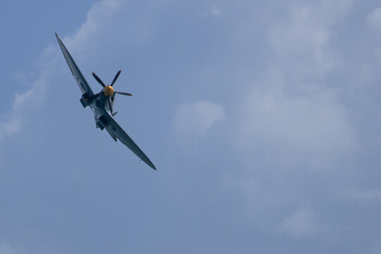 Spitfire plane in flight on sunny day. High quality photo