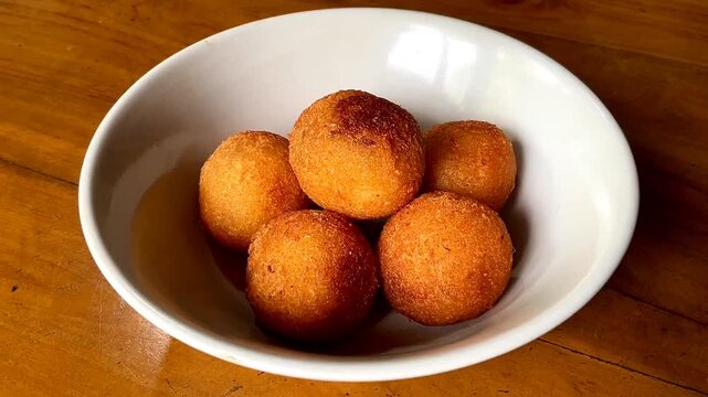 Misro is a typical snack from West Java Indonesia. This snack is made from grated cassava, the inside of which is filled with brown sugar and then fried.