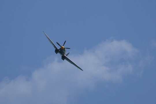 Spitfire plane in flight on sunny day. High quality photo
