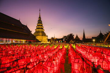 Red lanterns and golden stupa, Lamphun, Chiang Mai, Thailand