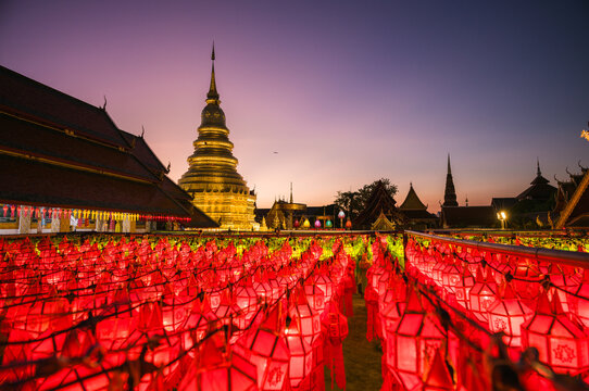 Red lanterns and golden stupa, Lamphun, Chiang Mai, Thailand