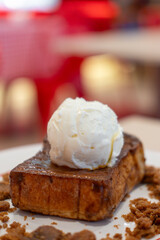 Milk ice-cream on the toast, served on plate