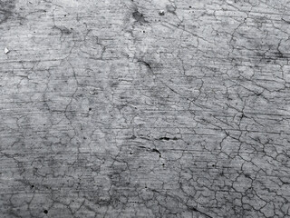 Distressed concrete texture with cracks and imperfections, perfect for adding depth and grit to your design projects, ideal for urban and industrial themes