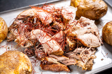 Slow-cooked pulled meat with spices