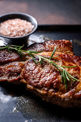 Grilled steak with rosemary