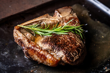Seared T-bone steak with rosemary