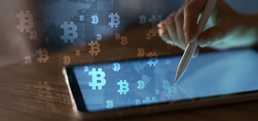 Blockchain and Cryptocurrency Transactions on a Digital Tablet.