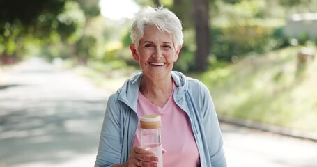 Senior, happy woman and face with water bottle for fitness, hydration or health in neighborhood. Portrait, elderly or female person with smile, mineral liquid or aqua beverage for wellness on road