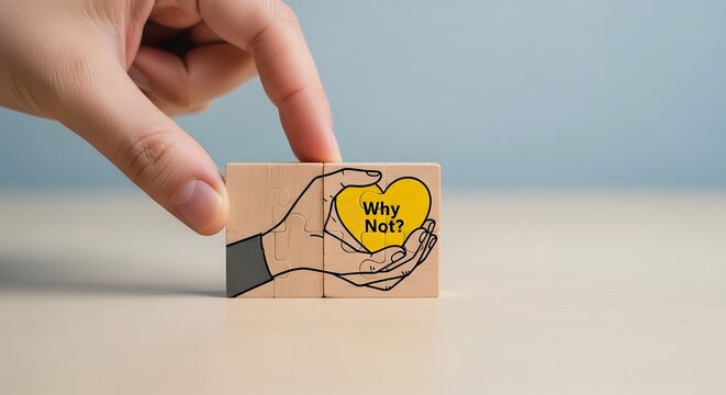 Hand holding wooden block with heart and we win message of support