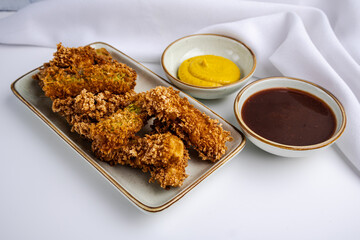 zucchini sticks fried in a deep fryer