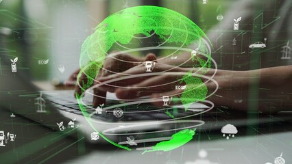 A person types on a laptop surrounded by a vibrant green digital globe and eco-friendly icons. This image represents sustainability, innovation, and environmental awareness in technology. Xenic