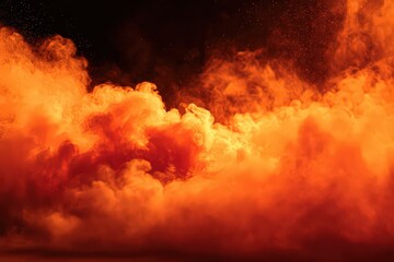 Dramatic Orange Powder Cloud Explosion on Black Background with Glittering Dust Particles for Abstract Design Element
