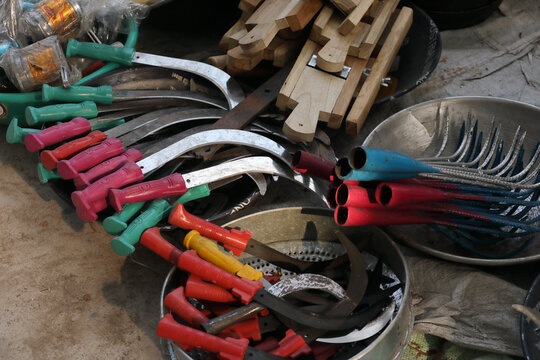South Indian agricultural sickles at a market for sale