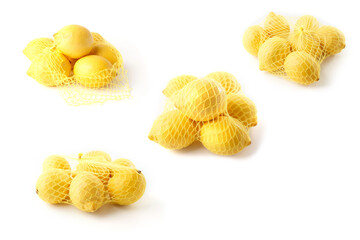 Group of ripe lemons in netting on clean surface, perfect for food delivery services, healthy lifestyle campaigns, restaurant menus, organic product catalogs, wellness branding, kitchen visuals.