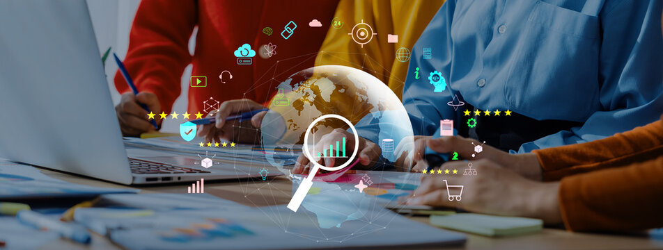 A diverse team engages in a collaborative strategy session using digital tools and data visualization. Creative brainstorming and technology drive their project success. Trope