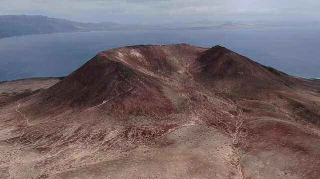 Aerial view of the volcanic crater Bermeja  mountain on La Graciosa island in the Canary Islands