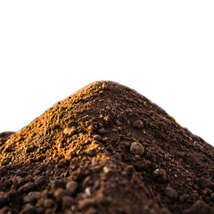 A Pile Of Dark Brown Fertile Soil With Small Pebbles Lit By Warm Sunlight Against A Black Background