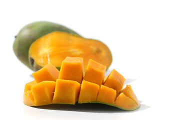 Ripe mango with slice isolated on white background.