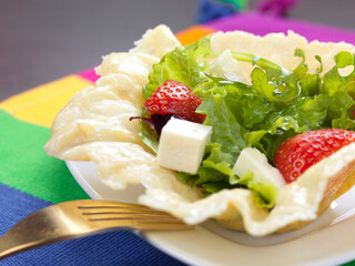 strawberry  salad in a cheese shell