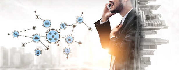 A businessman engages in a phone call surrounded by digital connectivity icons, symbolizing modern business communication and urban development in a thriving city. Tessel