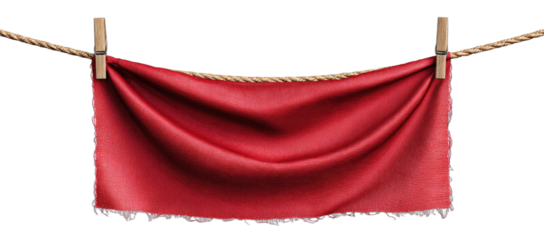 Vibrant red fabric cloth draped and held by clothespins on a rope