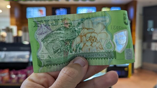 Closeup of Fijian five dollar currency money green note in Nadi, Fiji, South Pacific - taken on 19 Nov 2025