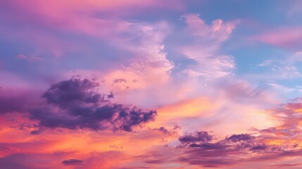 Obraz premium Vibrant Sunset Sky with Pink Orange and Purple Clouds Abstract Cloudscape with Dramatic Lighting and Serene Atmosphere Sky Art Photography