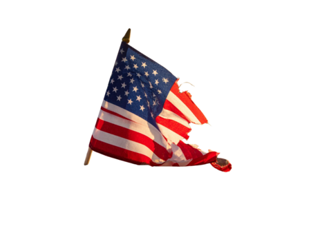 Torn American flag on the grey dusty ground